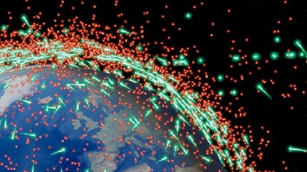 在CesiumJS的地球仪上，卫星和轨道上的碎片用红色和绿色表示