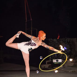 Hannah dances with a flaming hula hoop
