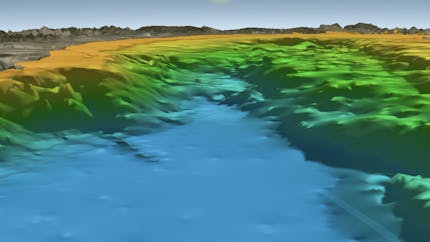 Digital 3D model showing sun and brown mountains and terrain above sea level, changing color to yellow, green, and blue as depth increases underwater.