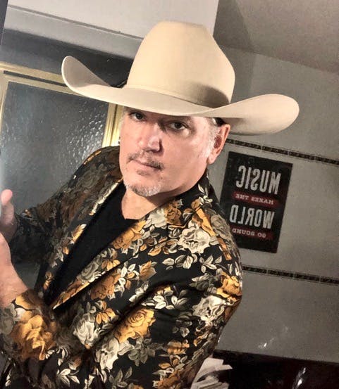 Musician Ray Guillemette, Jr. wearing a cowboy hat