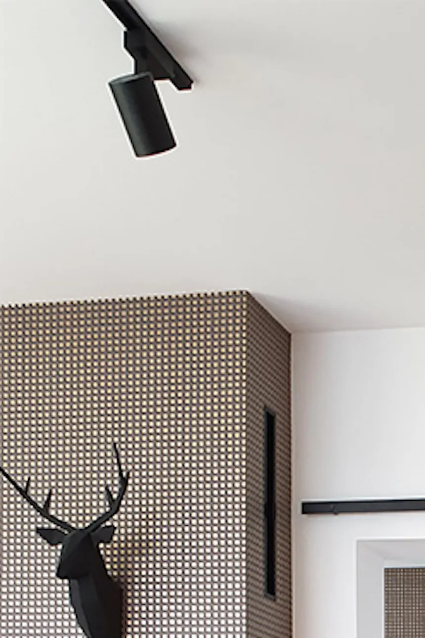 Parquet flooring in living room, herringbone floor, wood with metal elements, sliding doors