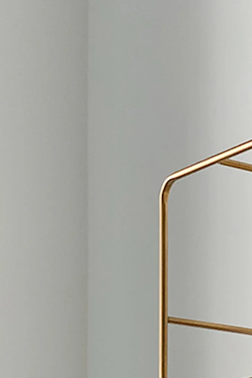 gold wall shelf, gold interior accessories, modern style