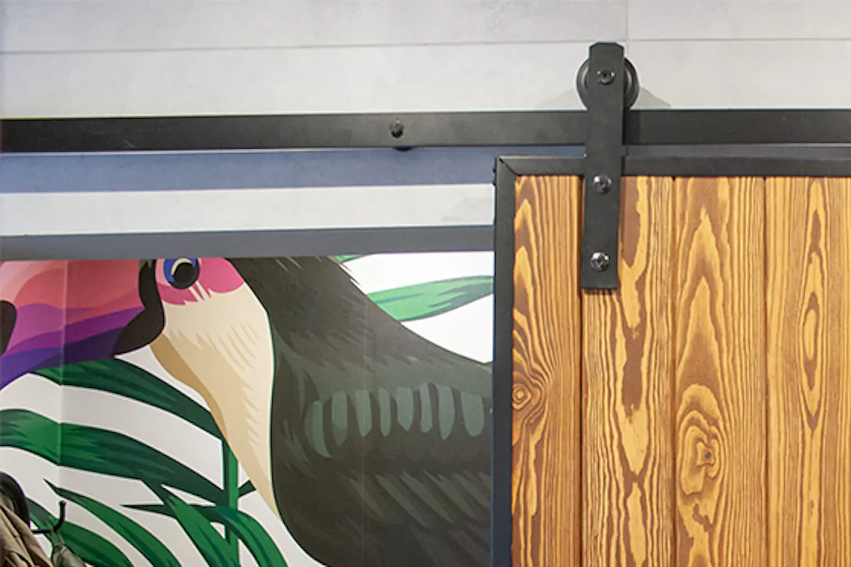 Sliding door in metal frame, sliding system, sliding doors to cabinet