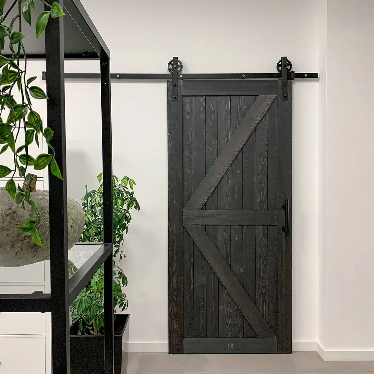 black and white interior design of the office with sliding doors