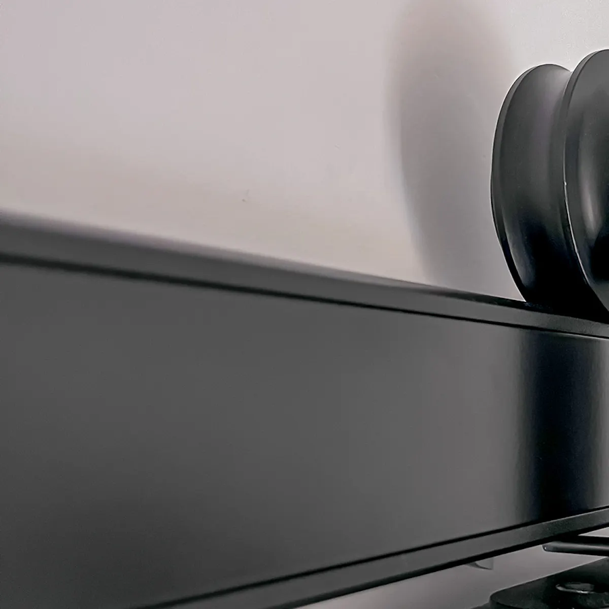 Black sliding system for wood doors.