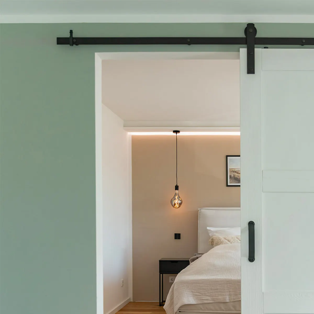 Modern white solid wood sliding doors on black sliding system