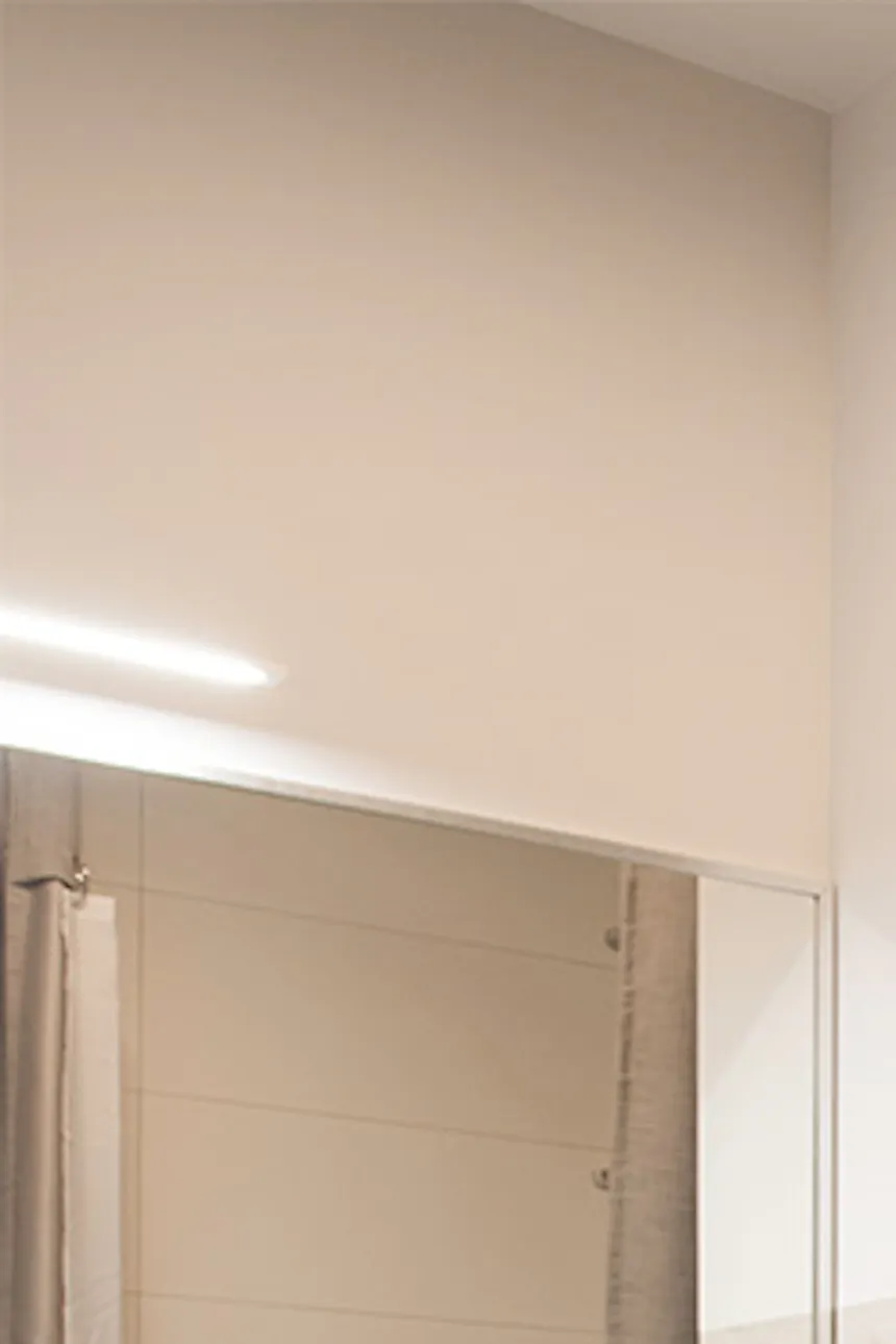 Sliding doors to bathroom with metal handle