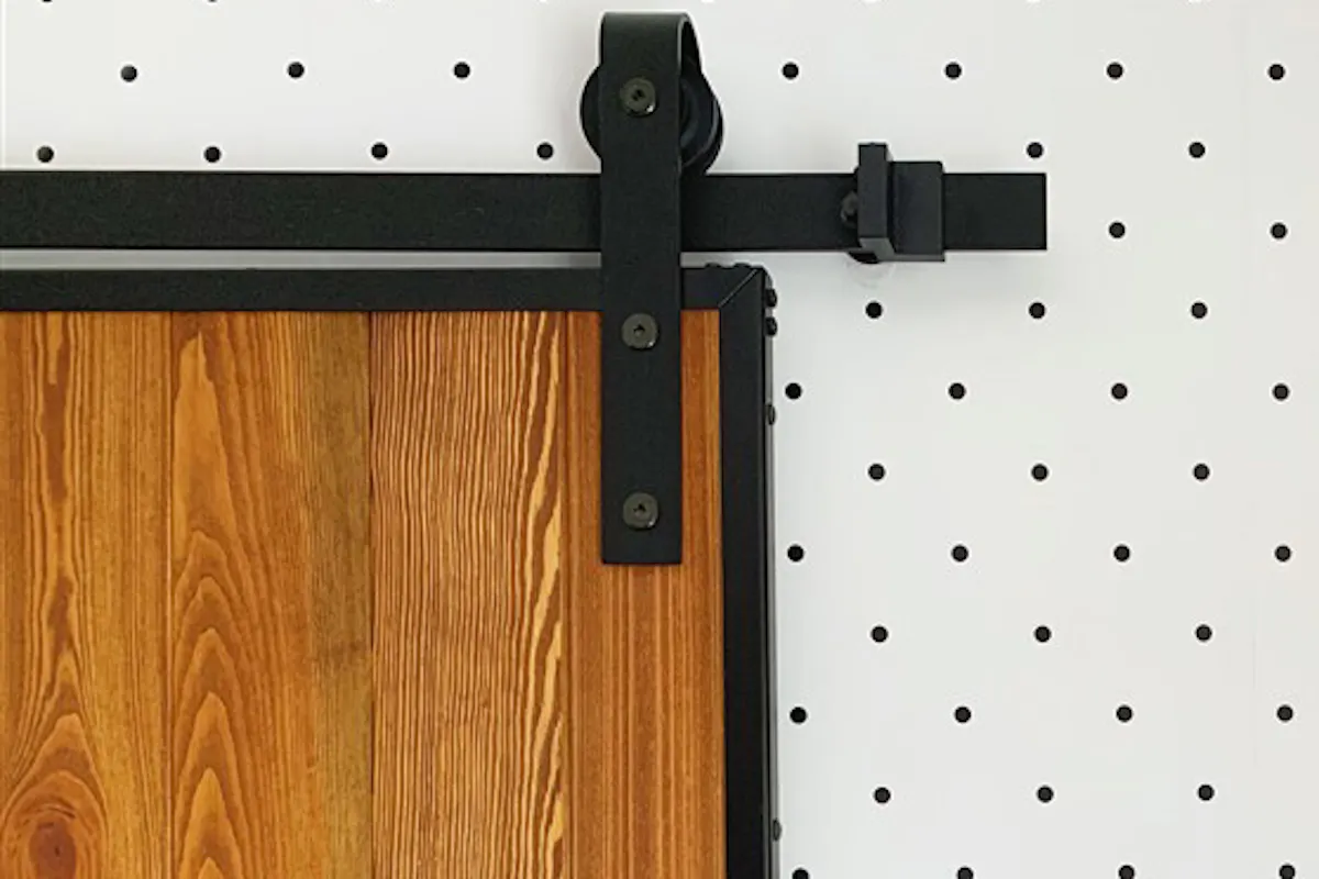 Loft-style door, wooden door in metal frame, wood and steel sliding door, bedroom wallpaper idea, dotted wallpaper, sliding door system, sliding door hanger, sliding door guide rail