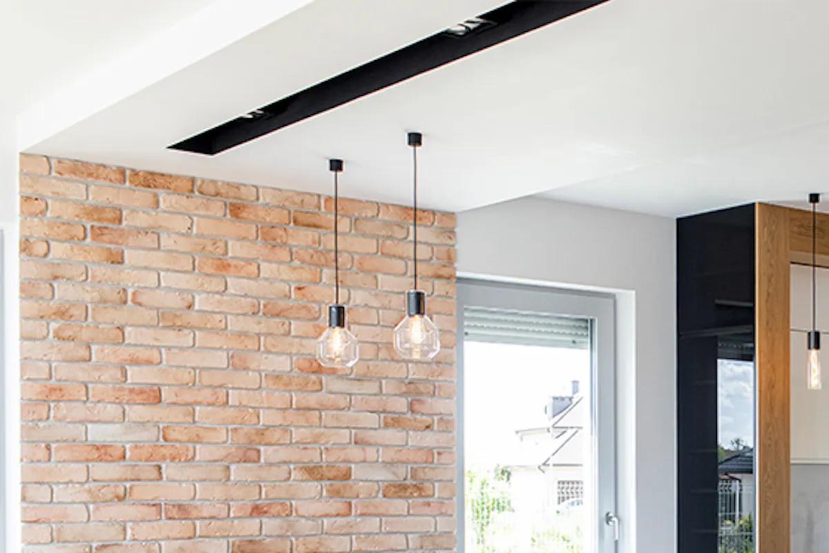 Dining nook in kitchen, large open kitchen, industrial lamps in kitchen, neon sign, white kitchen furniture, high-gloss kitchen cabinets