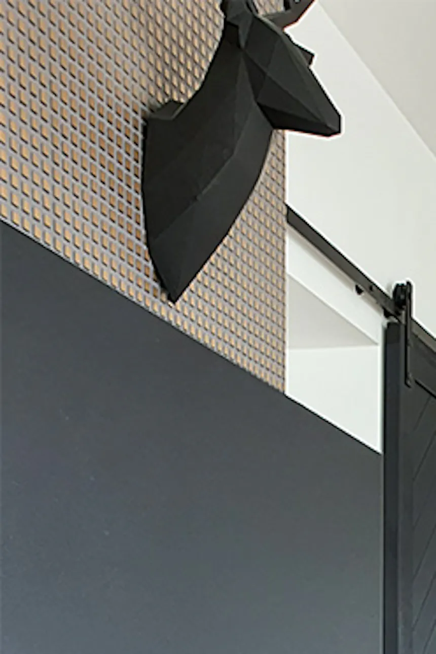 Living room with sliding doors, gray and black, gray and wood tones, gray armchair