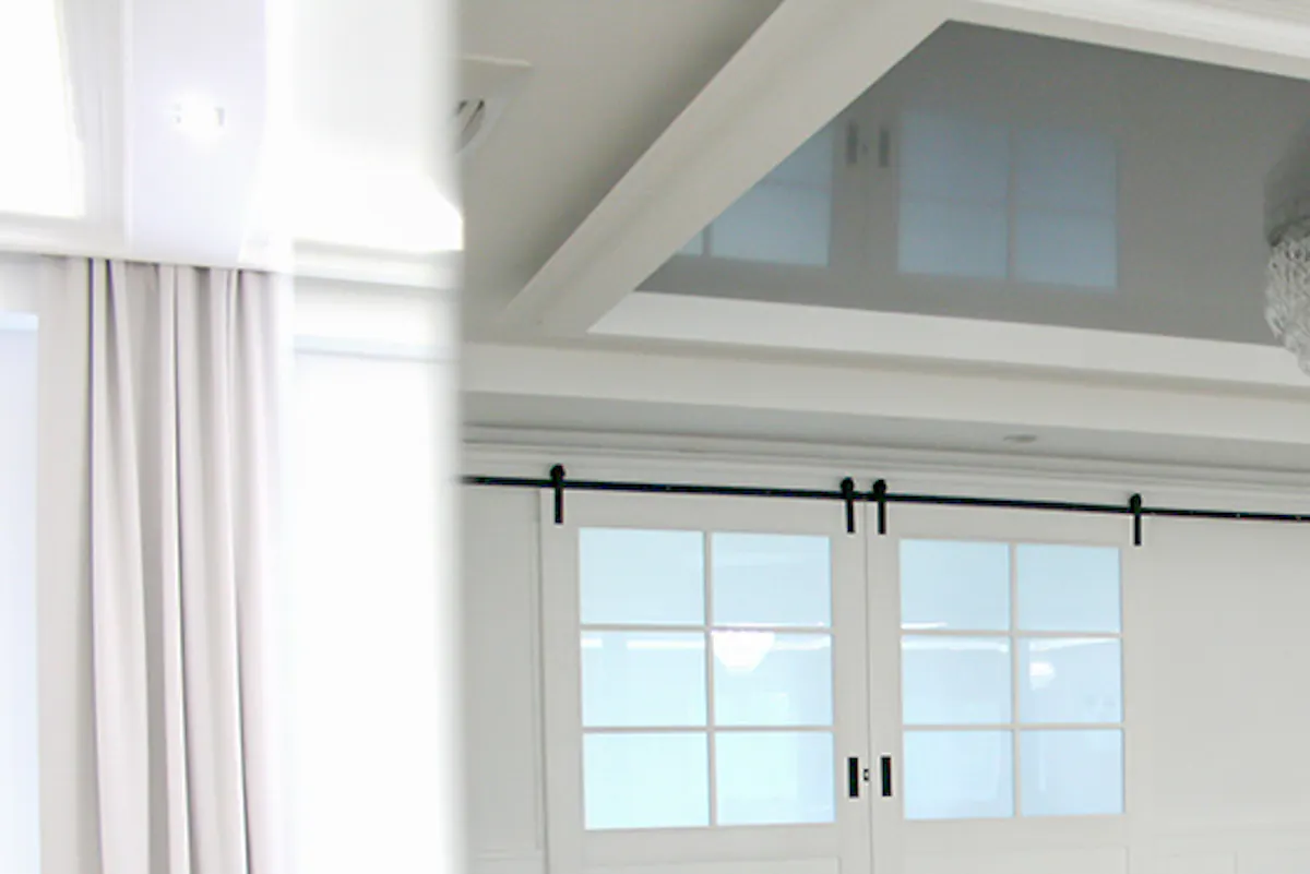 white sliding doors, large sliding doors, double sliding door, sliding doors with glass, white wooden doors with glass, ballroom entrance, crystal chandelier