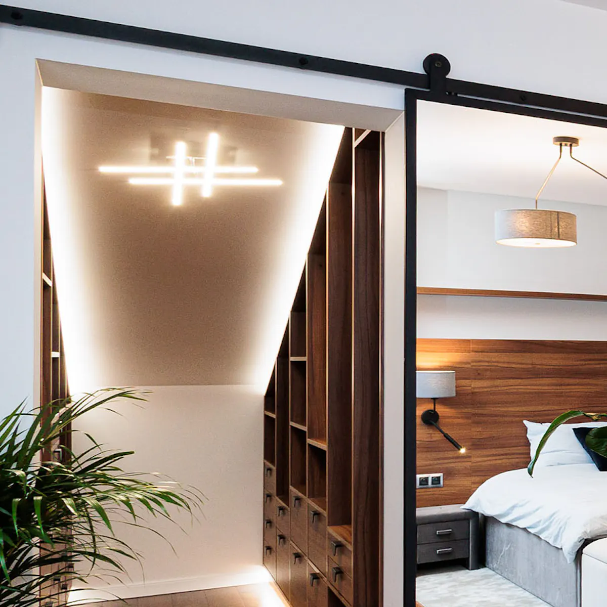 portes coulissantes avec miroir donnant sur un dressing de style moderne