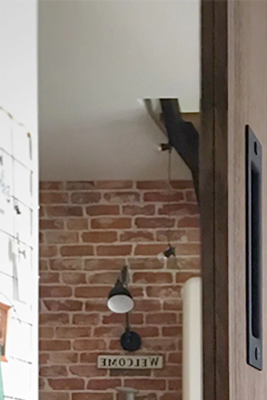 Loft interior, vintage furniture, loft stairs, brick wall in living room, vintage refrigerator, retro accessories, industrial lamps, parquet in living room