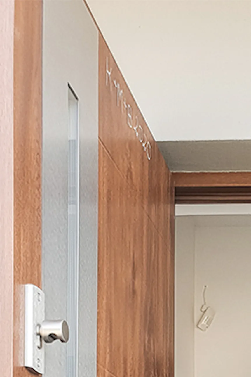 Anthracite wooden door in entryway, wooden sliding door