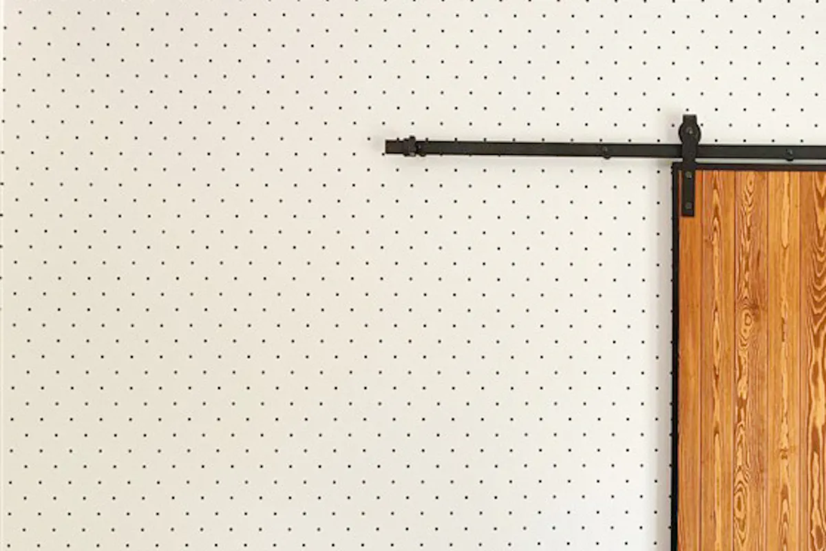 Loft door, wooden door in metal frame, wood and steel sliding door, pine door, bedroom sliding door, wooden door, dotted wallpaper, bedroom wallpaper idea, wardrobe door, white Scandinavian-style table, rocking chairs in bedroom