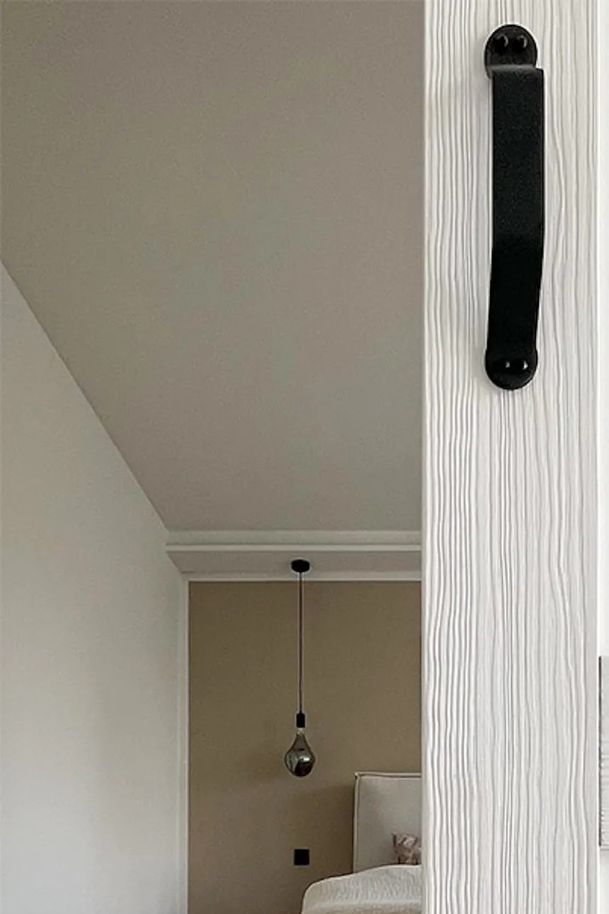 Modern white solid wood sliding door with deep brush finish, bedroom entrance
