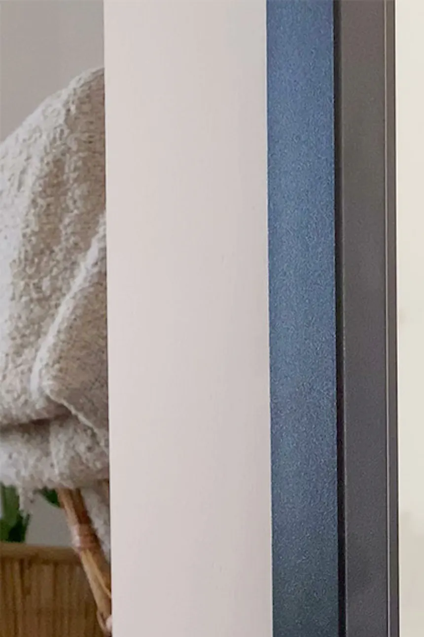 Glass sliding door in a metal frame