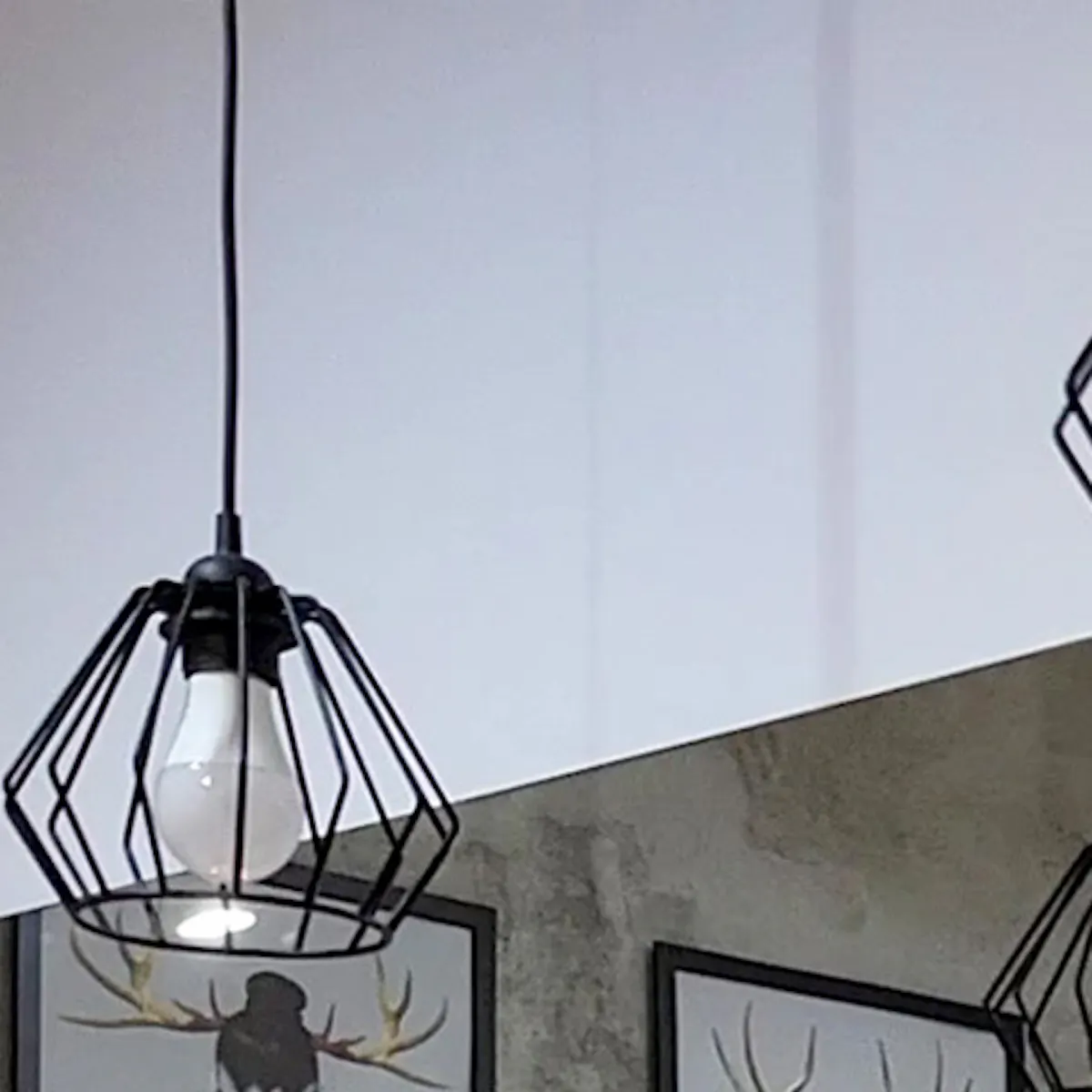 lamps and loft-style decorations in a white and gray bathroom