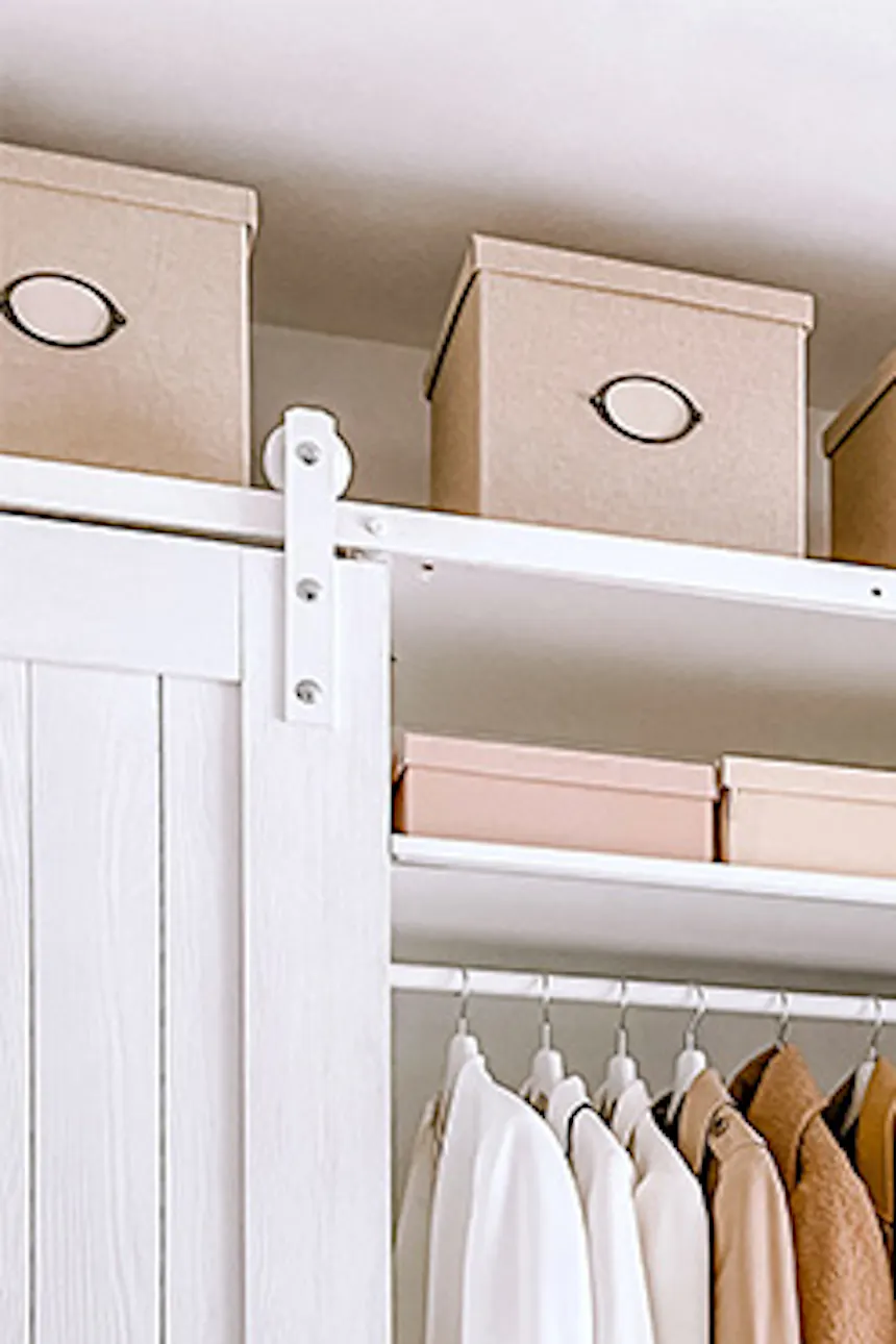 large white wardrobes, a system of white wardrobes and shelves in the dressing room, walk-in closet in white