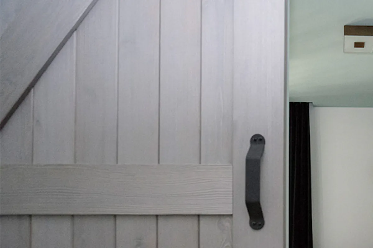 wooden sliding doors, barn sliding door, gray wooden sliding door, sliding door handle, bedroom sliding door, bedroom entryway, modern style bedroom, grey tones bedroom, decorative wallpaper
