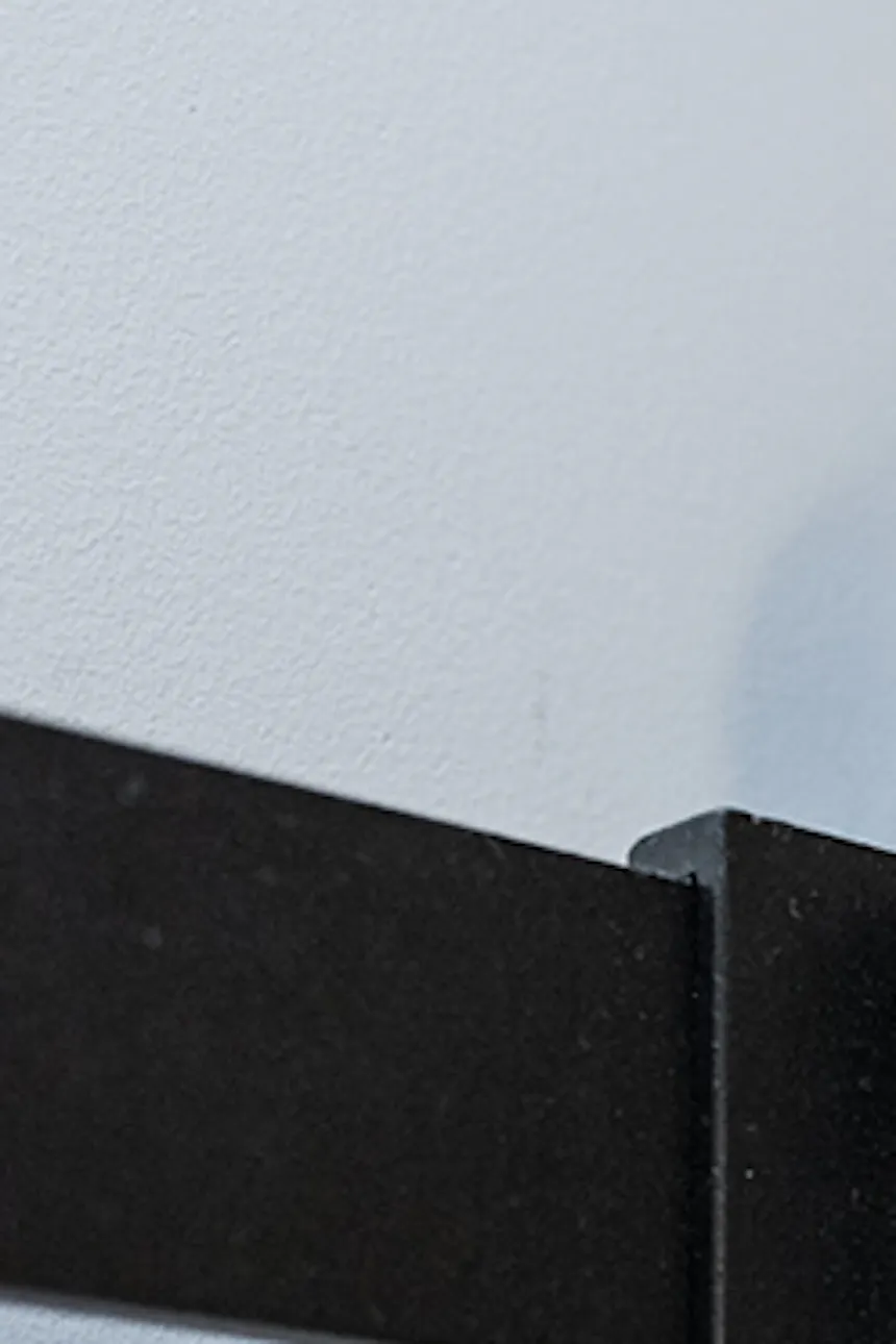 Black sliding door system for white sliding doors