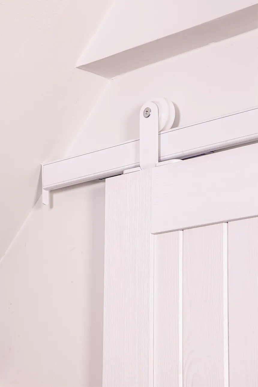 white wooden doors on a white sliding system