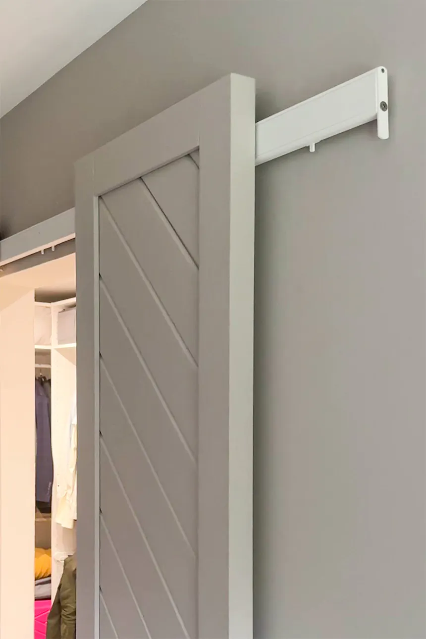 Doors in wall color on white sliding system