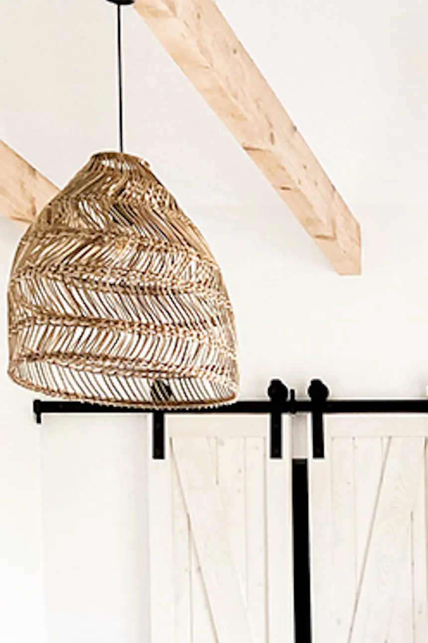 white bedroom, rustic bedroom, rustic white and wood in the bedroom, ethno-style hanging chair, bamboo hanging lamp in the bedroom, natural colors, light colors in the bedroom, bedroom with wardrobe