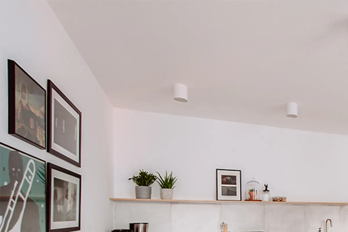 modern retro style apartments for rent, double sliding doors, white sliding doors, apartment with kitchenette, open space, white kitchenette