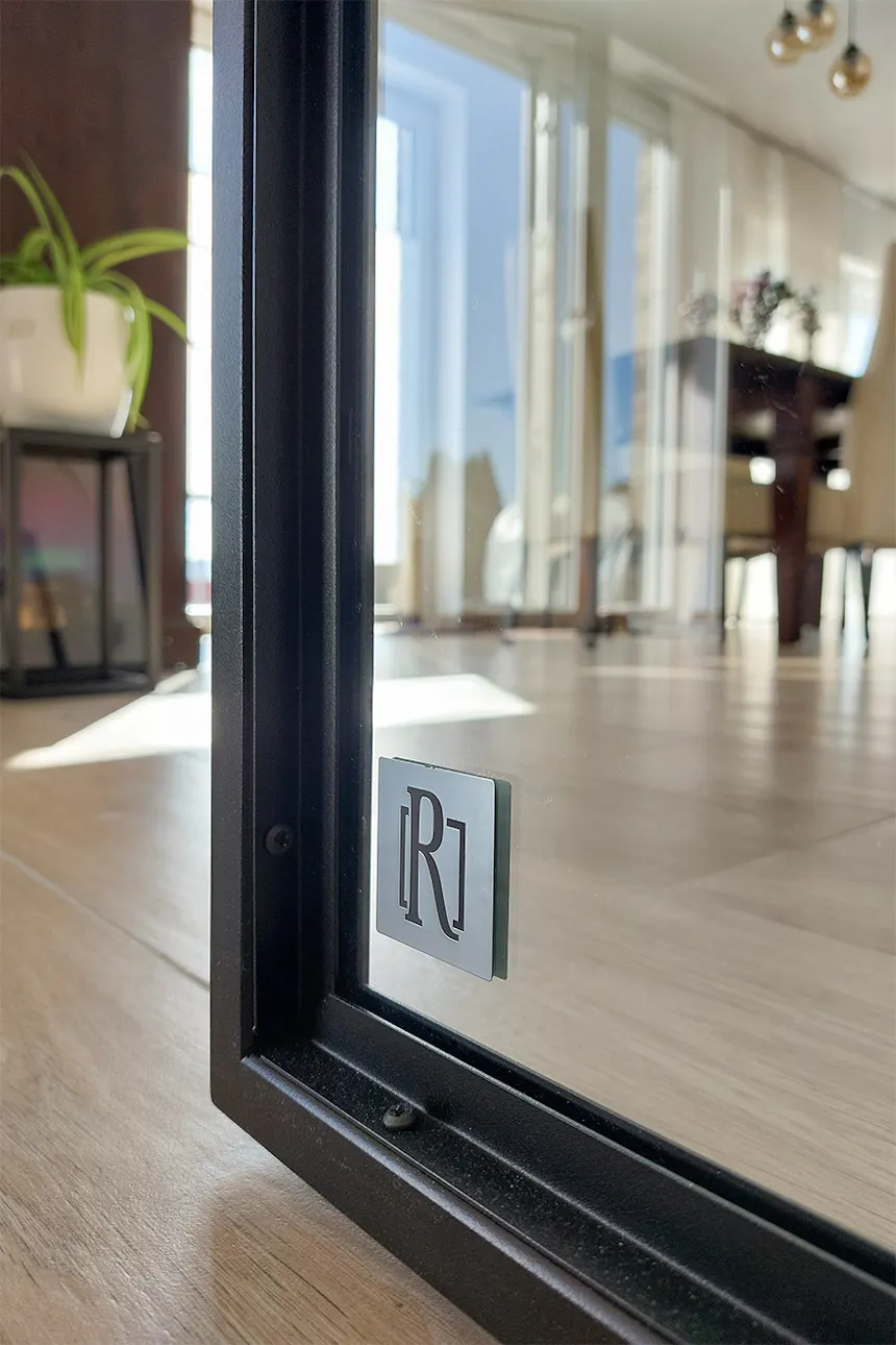 Detail of black metal and glass sliding doors