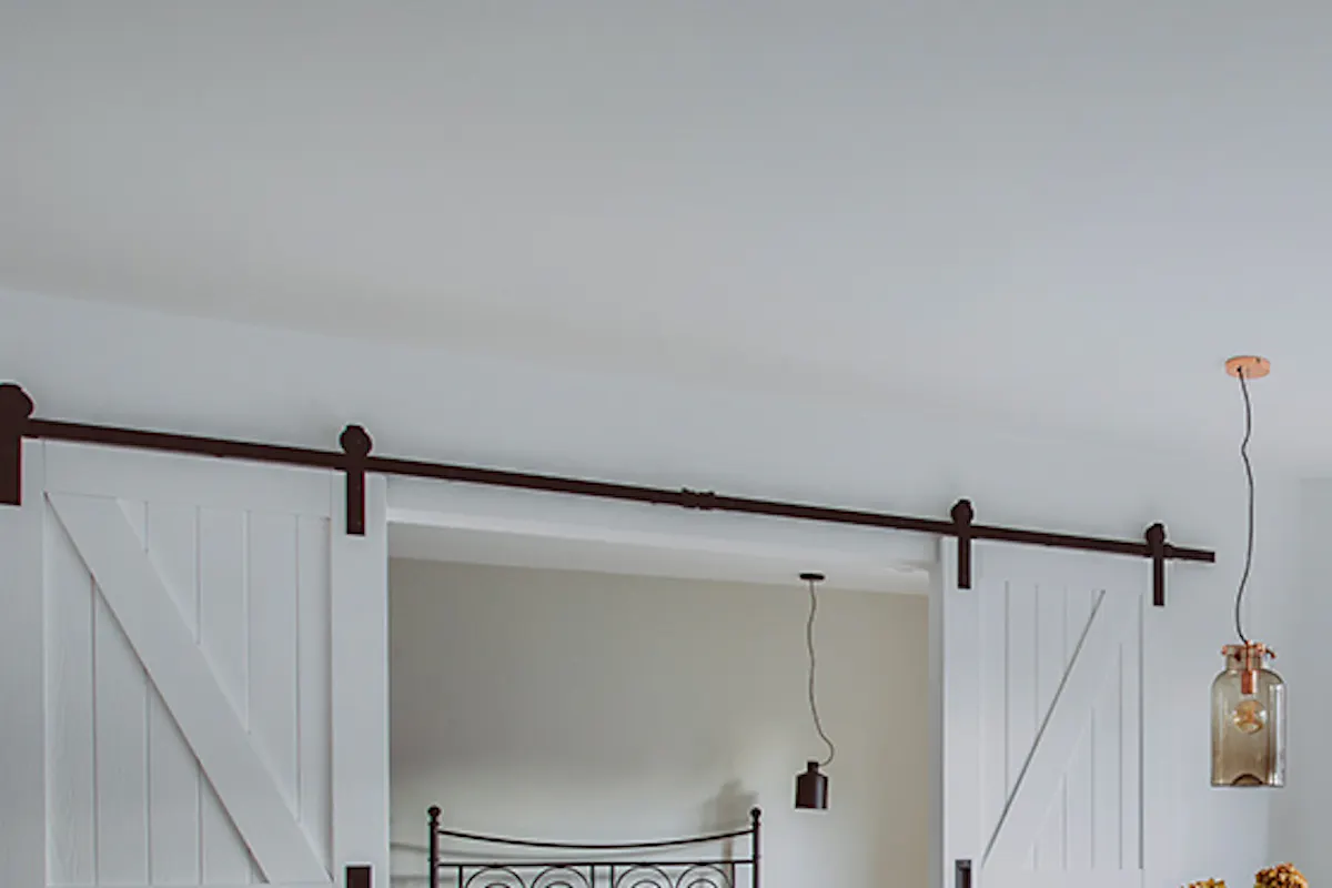 modern retro style, rental apartments, double leaf sliding door, double sliding door, white sliding door, barn door, open space, double bedroom door, metal bed