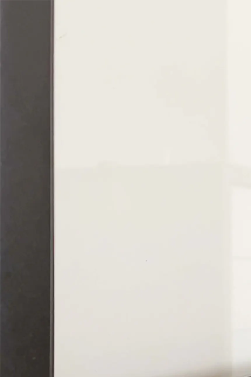 Glass sliding door in a metal frame