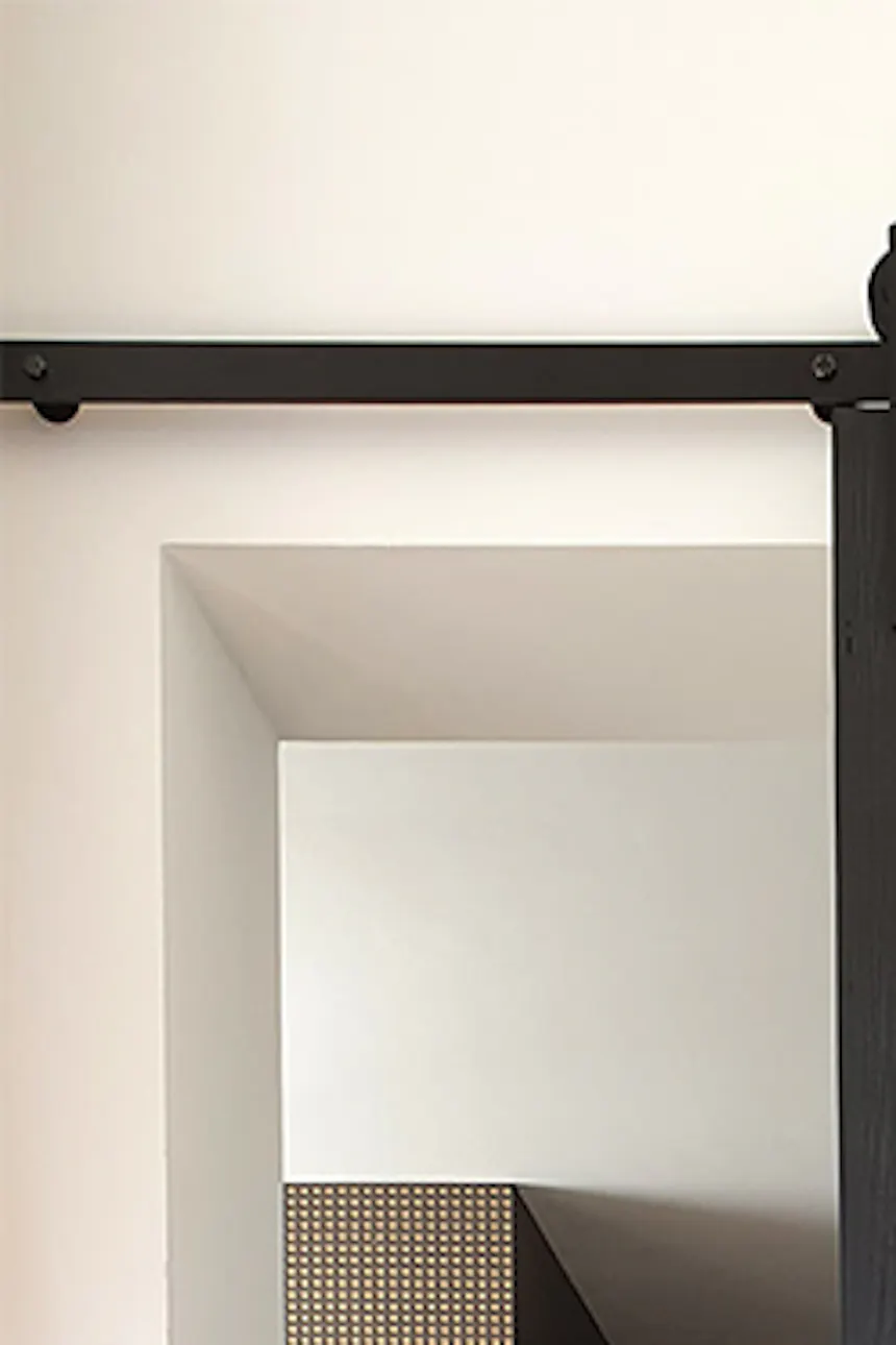 Black sliding doors, living room with sliding doors, entrance to living room
