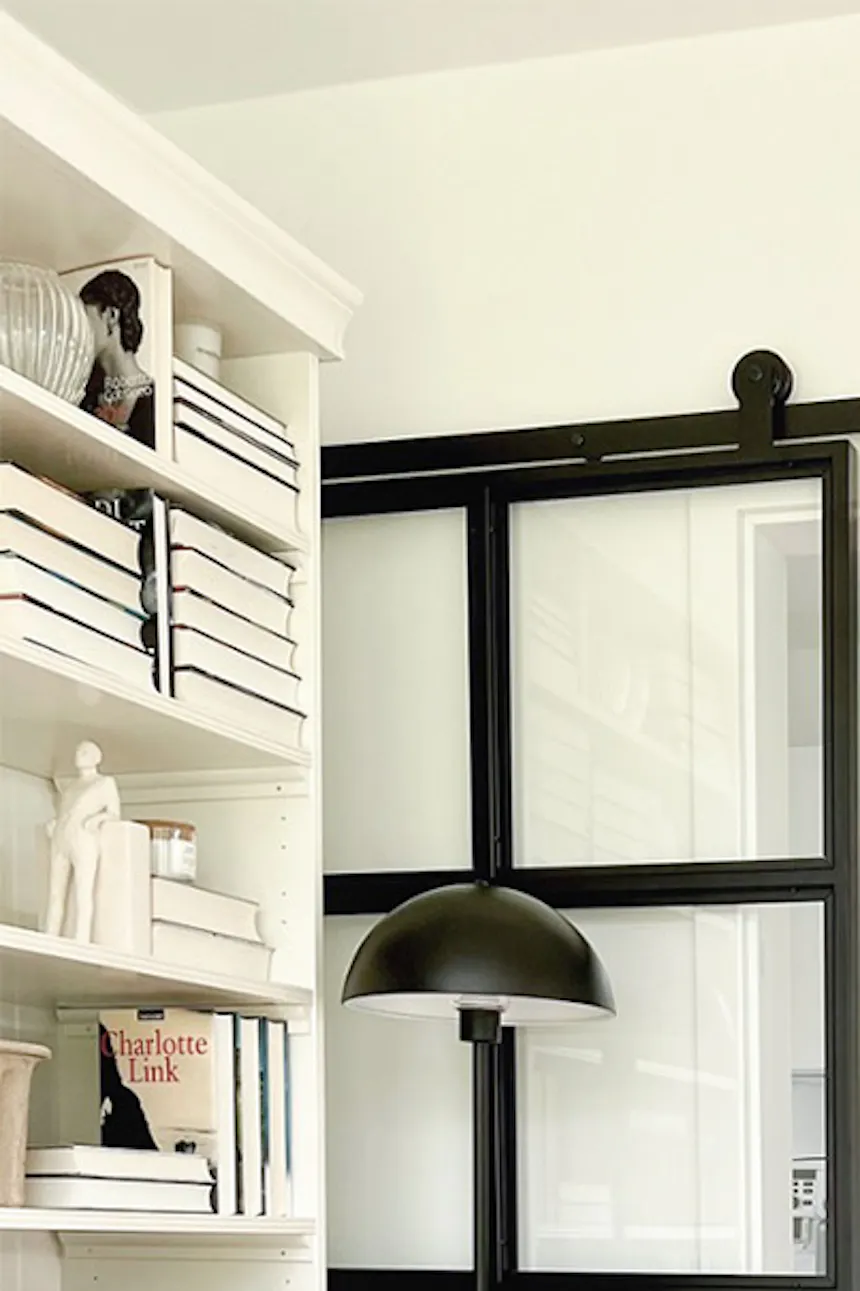 Kitchen entrance decorated in white, glass sliding doors to kitchen, industrial doors in Nordic style