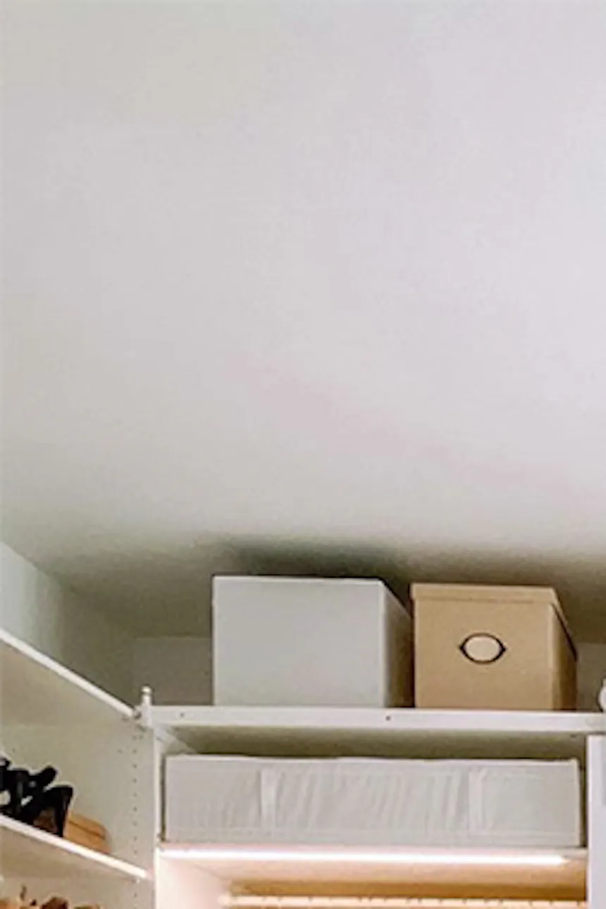 pendant lamp paper lampshade, white sliding doors for the wardrobe, barn door in the walk-in closet, a system of white wardrobes and shelves in the dressing room, large wardrobe in white, white doors on a white sliding system