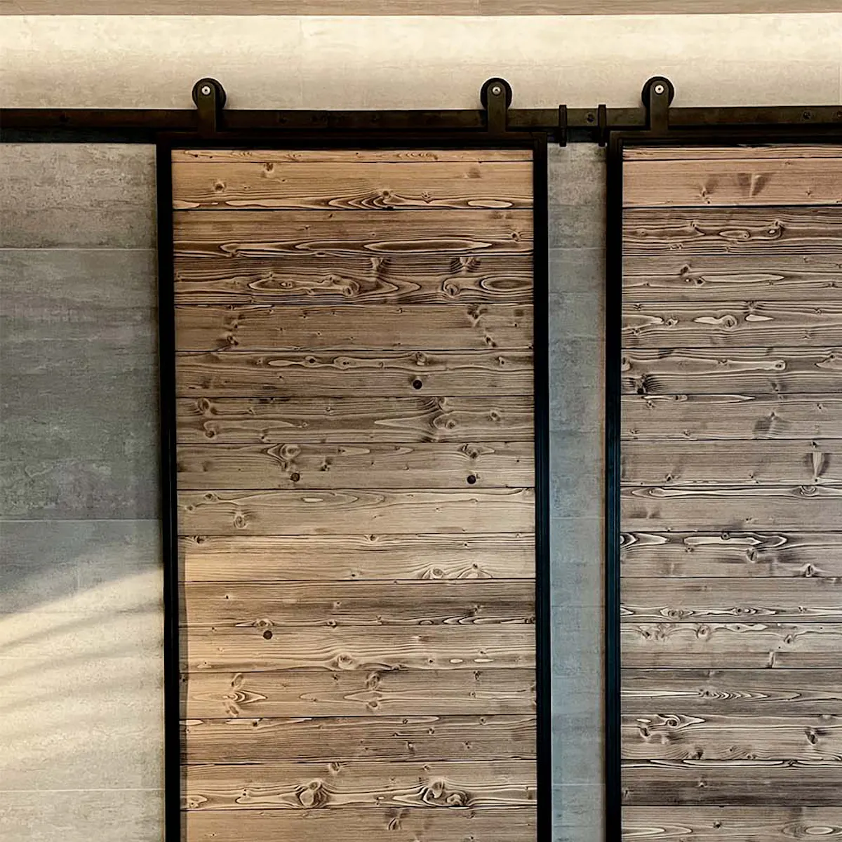 Industrial solid wood sliding doors in black metal frame
