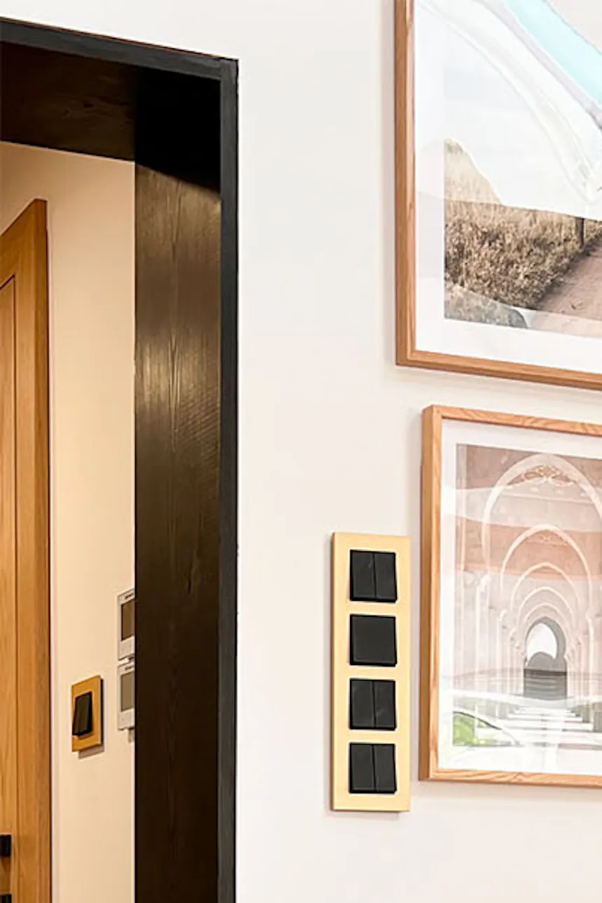 wall gallery with posters in natural earth tones