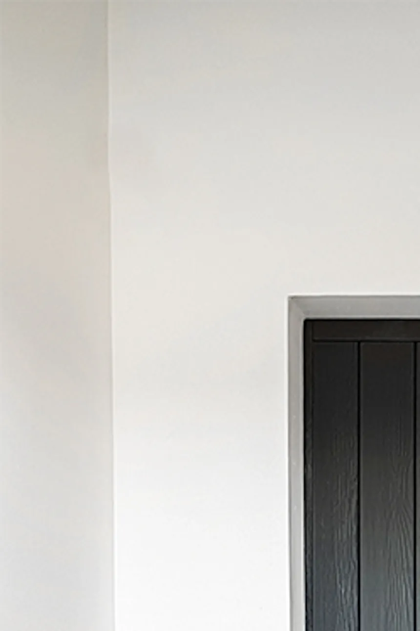 Anthracite wooden door in entryway, wooden sliding door