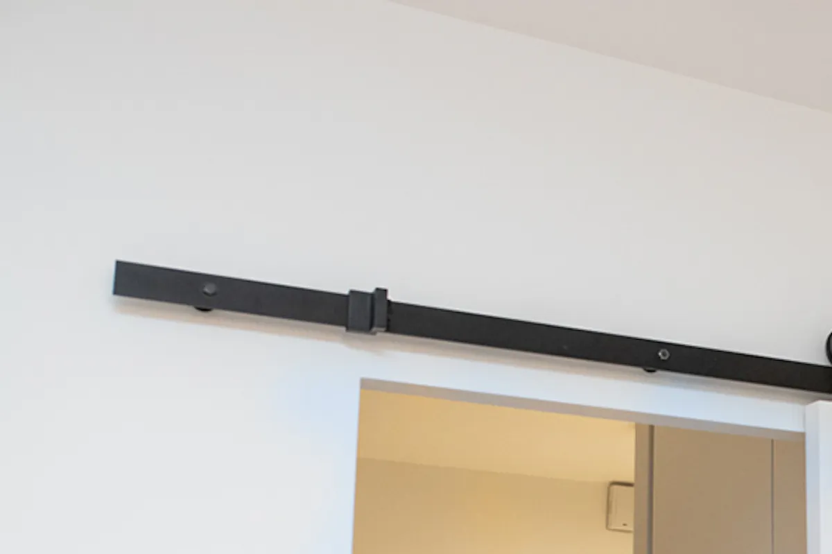 Sliding door system, track, hardware, sliding doors in apartment, wooden sliding doors, white sliding doors, elegant sliding doors, metal wall accents