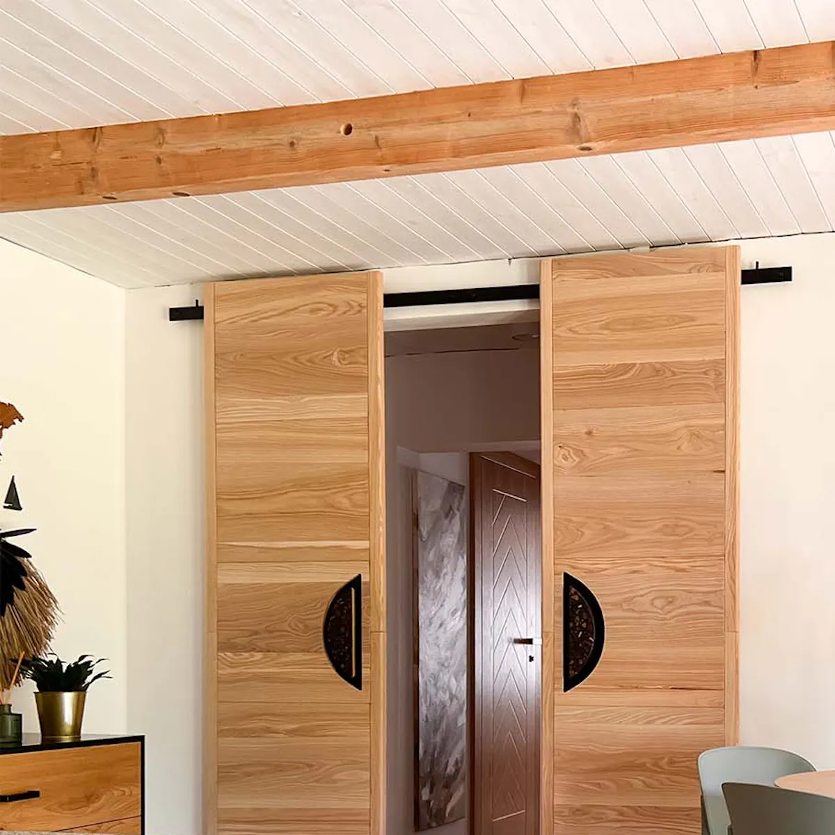 interior of a cosy guest room decorated in natural earth tones