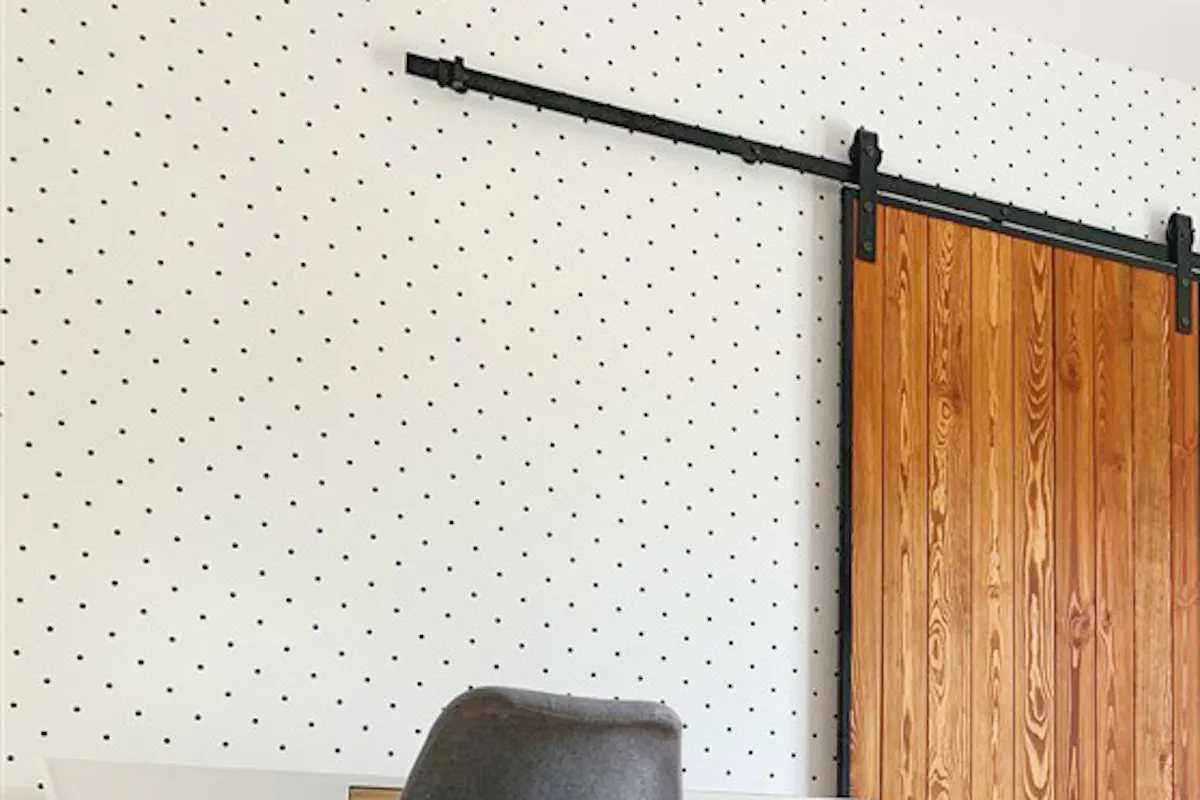 Loft door, wooden door in metal frame, wood and steel sliding door, pine door, bedroom sliding door, wooden door, dotted wallpaper, bedroom wallpaper idea, wardrobe door, Scandinavian-style accessories, rocking chair in bedroom, geometric pattern in bedroom, white table, small yellow bedroom table