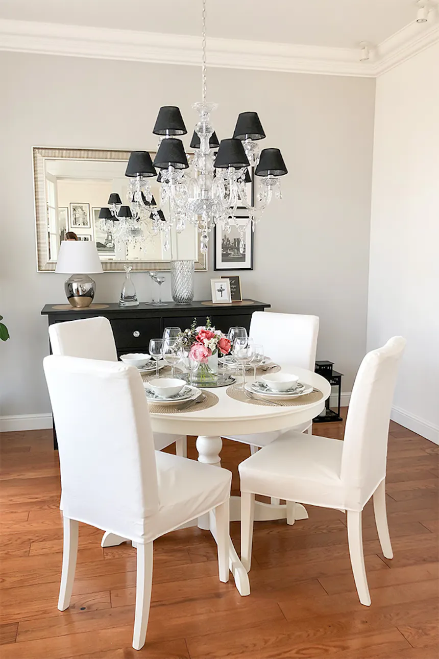 Glamor style interior, mirror in the living room, glamor style chandelier, living room dining area