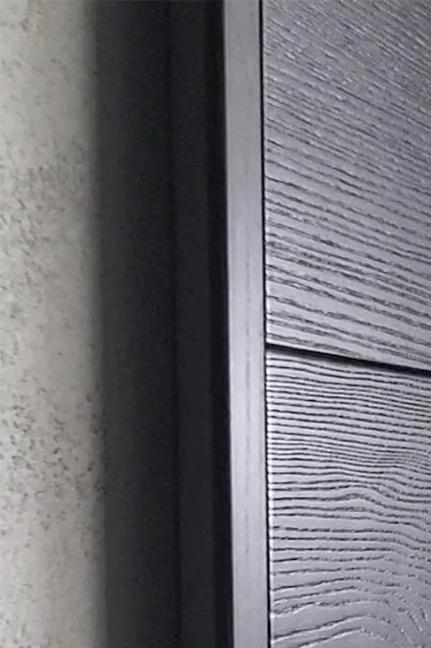 porte coulissante en bois noir avec poignée ronde