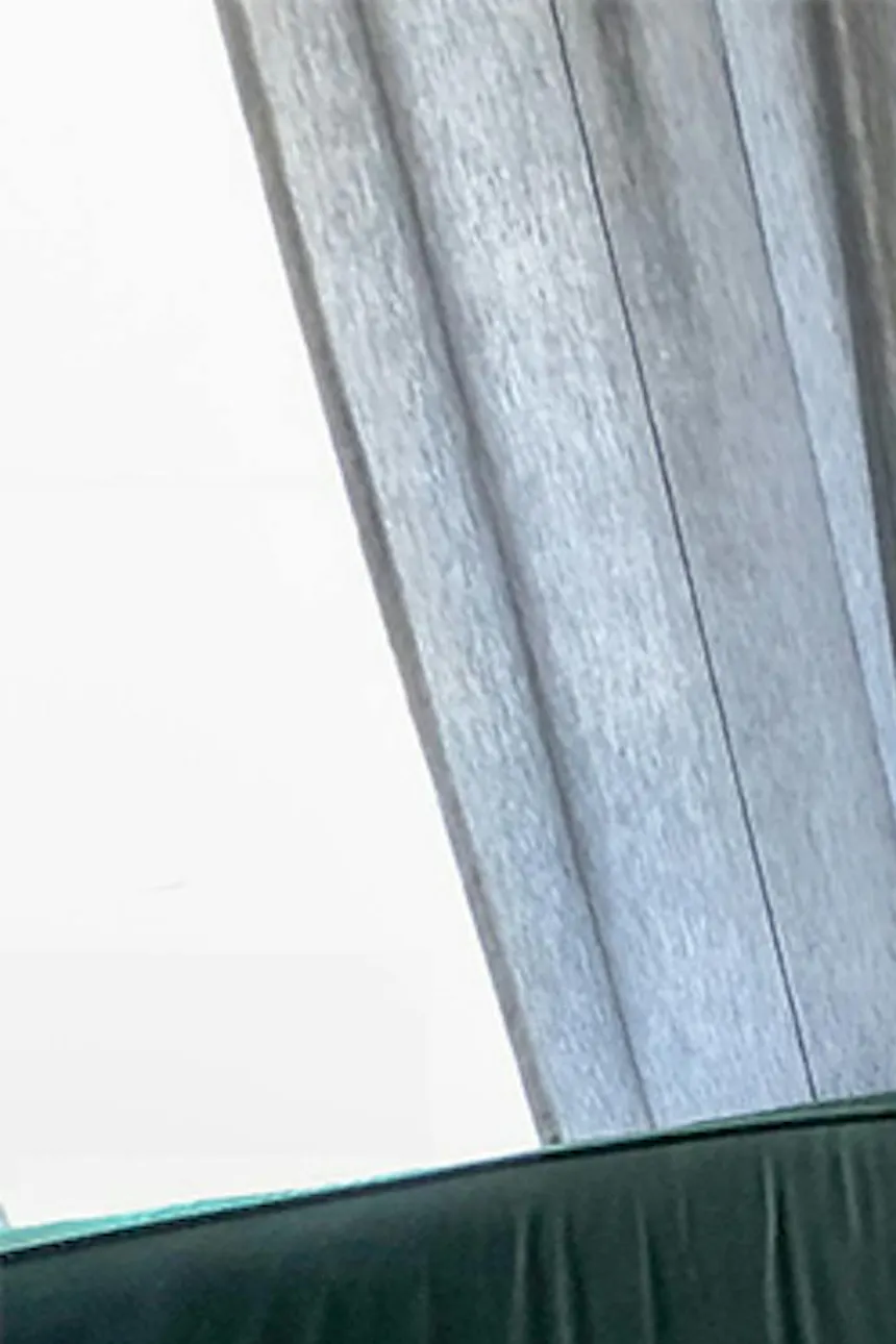 grand fauteuil de couleur vert bouteille