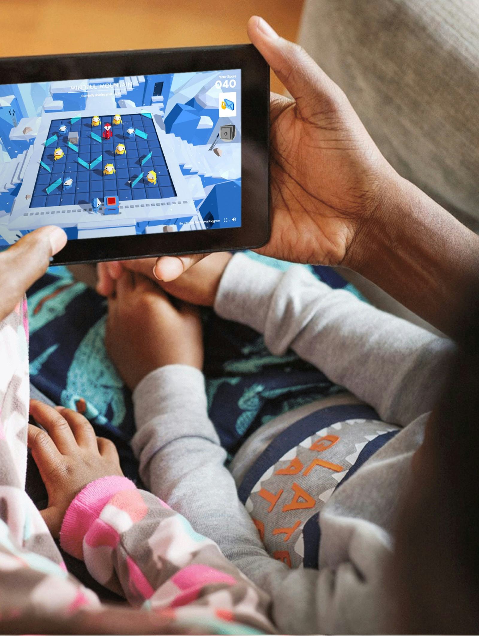 Parent playing Google Interland with children