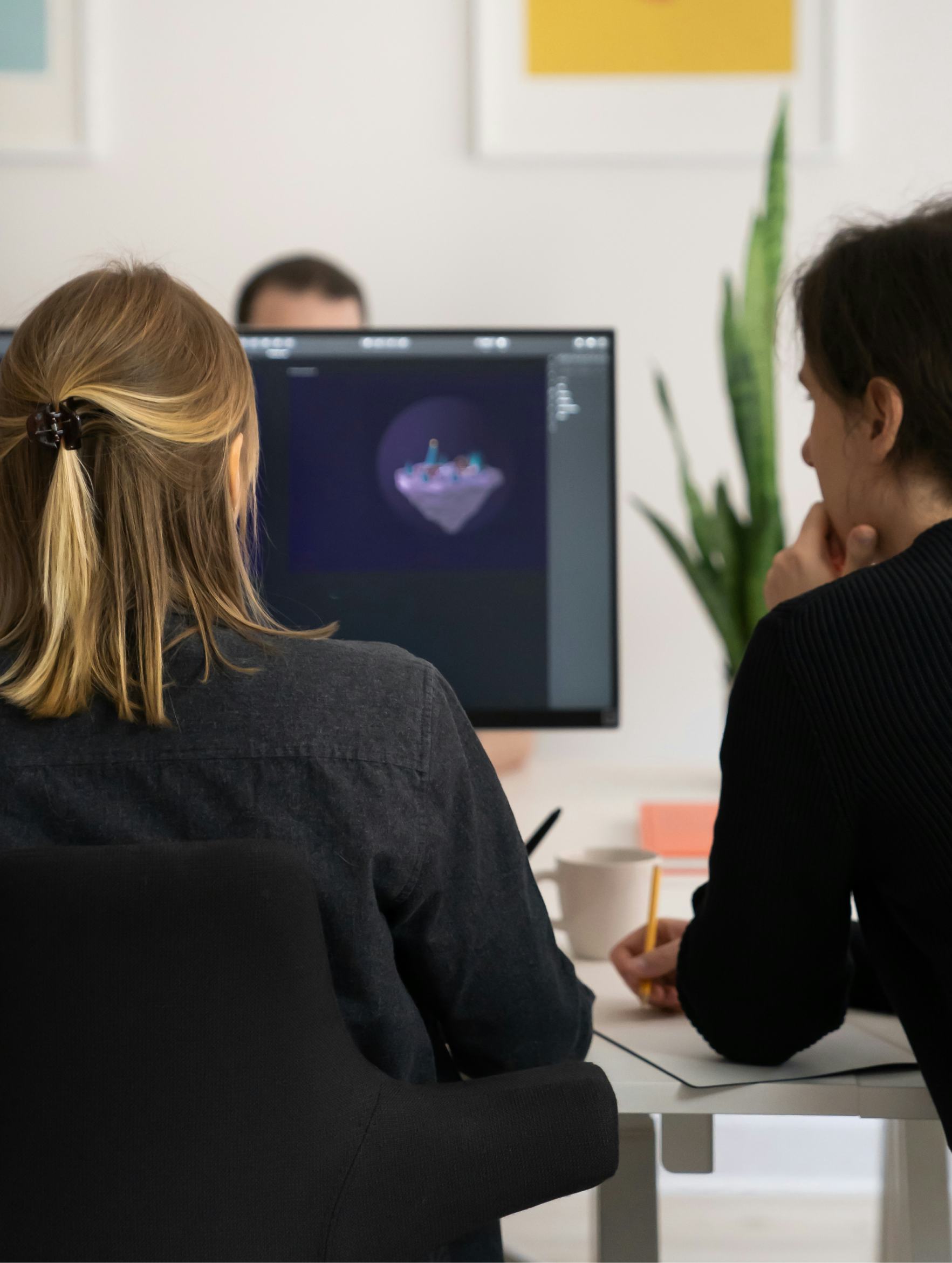 Photo of Aline and Stefan working together