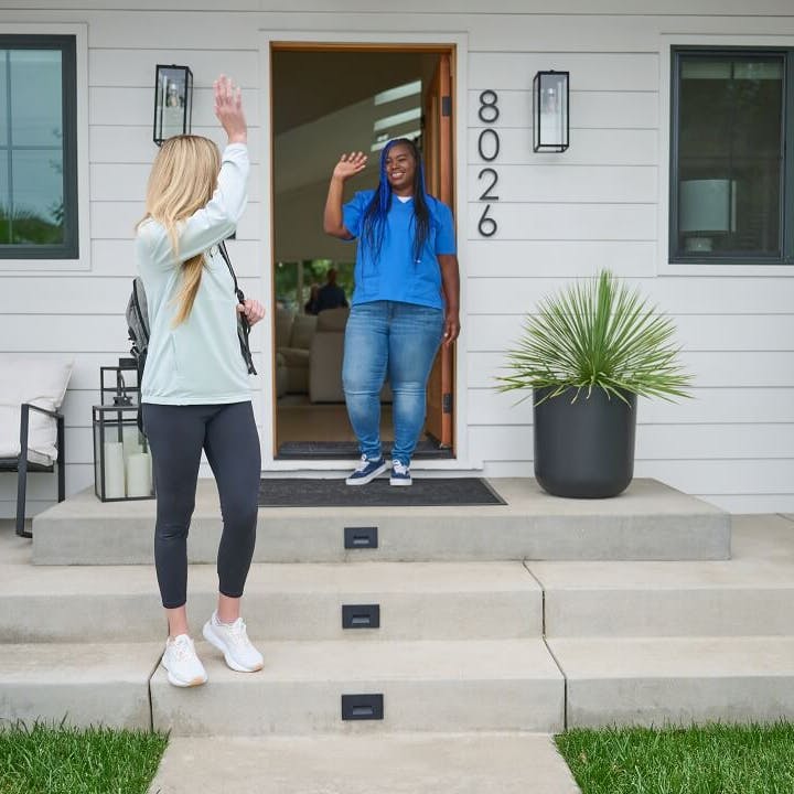 A 24 Hour Home Care caregiver waves goodbye to the primary family caregiver as they leave and the 24 Hour Home Care caregiver starts a respite shift.