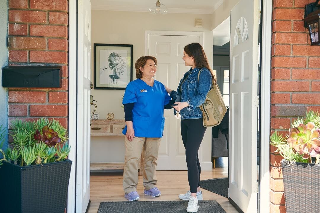 An adult caregiver assures her respite client that everything will be ok at home during a respite care shift.