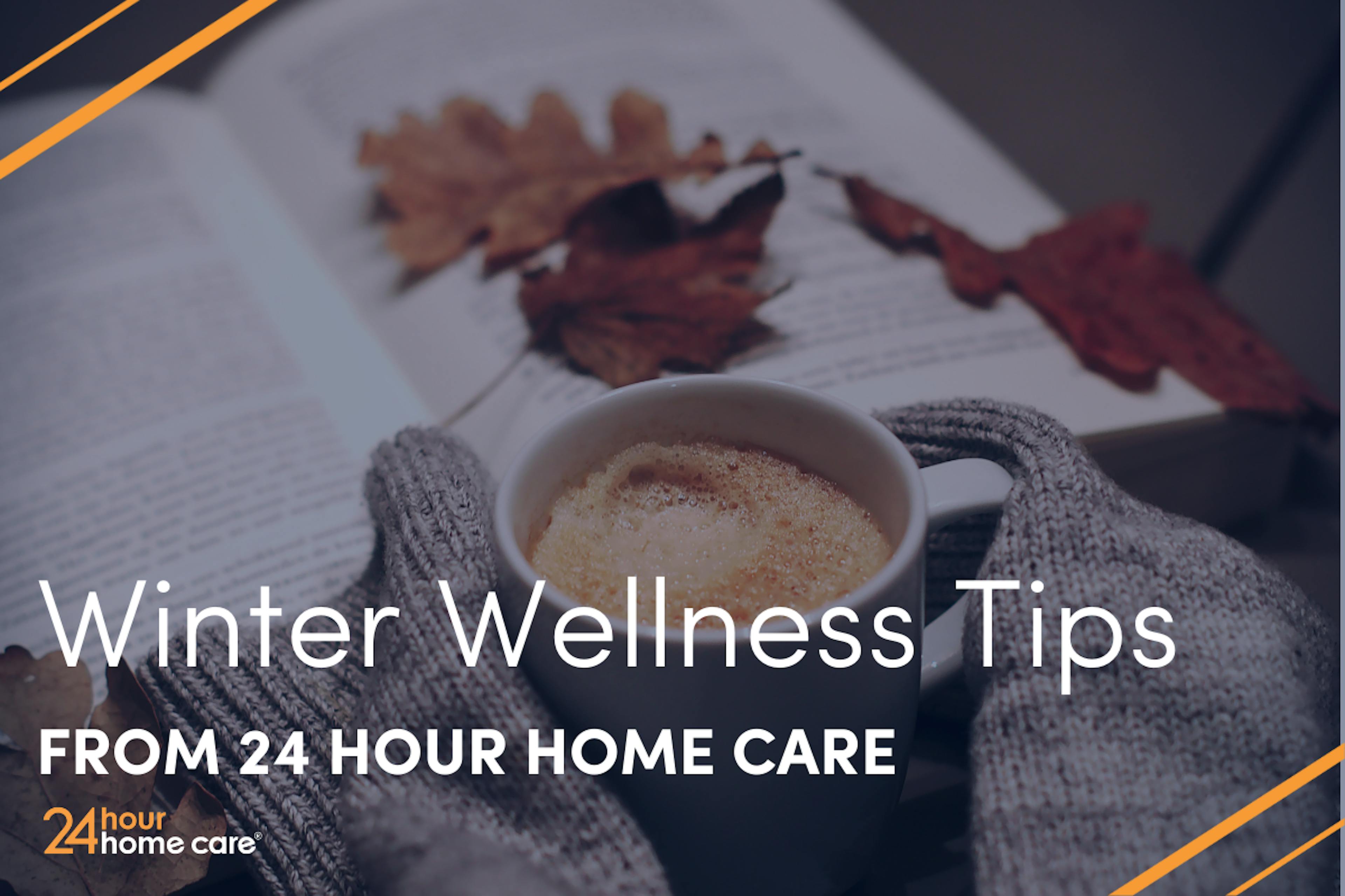 Cold hands hold a warm cup of coffee while a book is open in the background of the image.