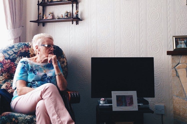 elderly-woman-in-living-room-chair